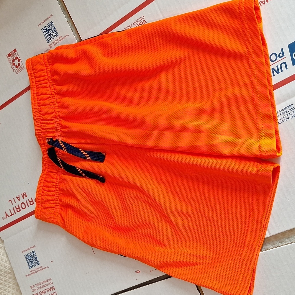 ORANGE BASKETBALL SHORTS SIZE 6